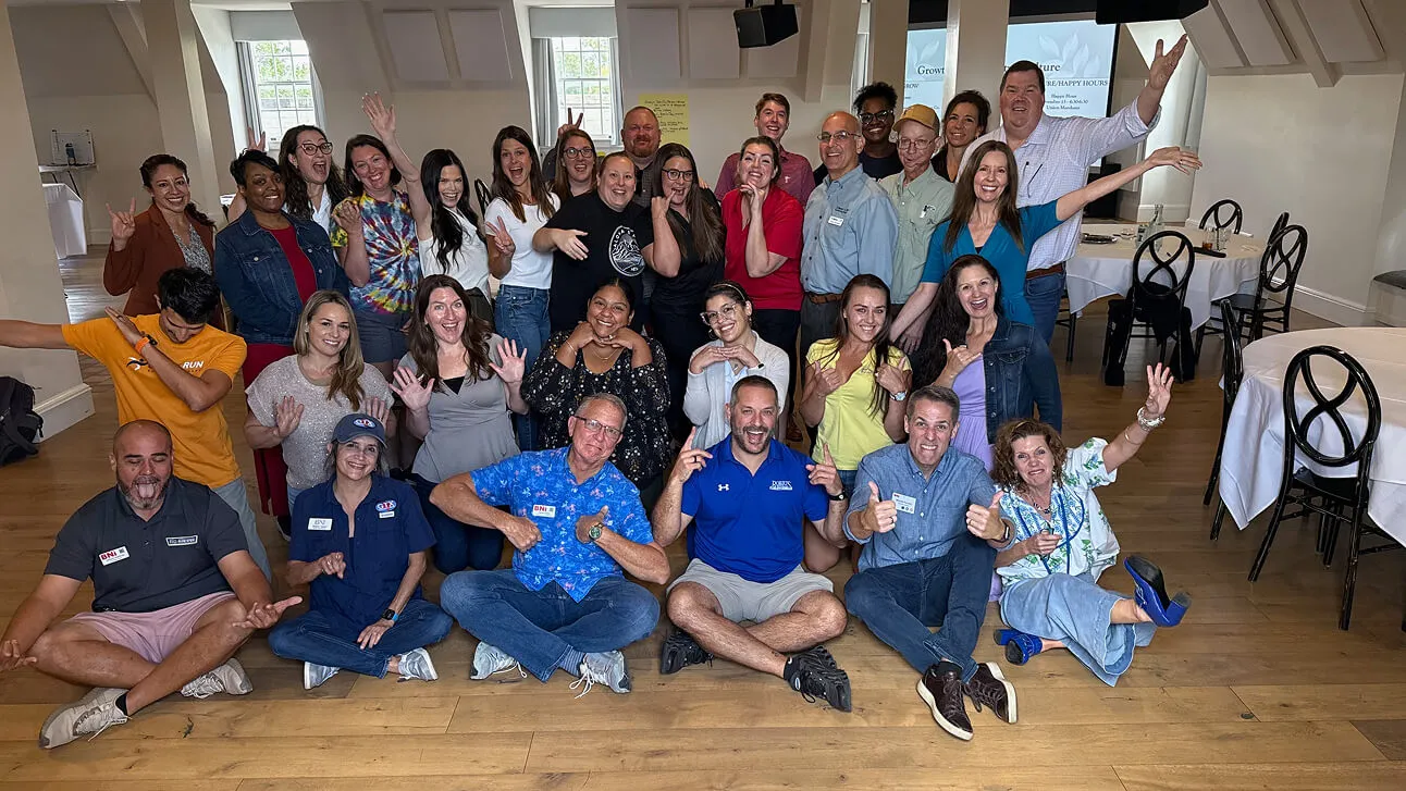 BNI GTX Georgetown chapter members celebrating together